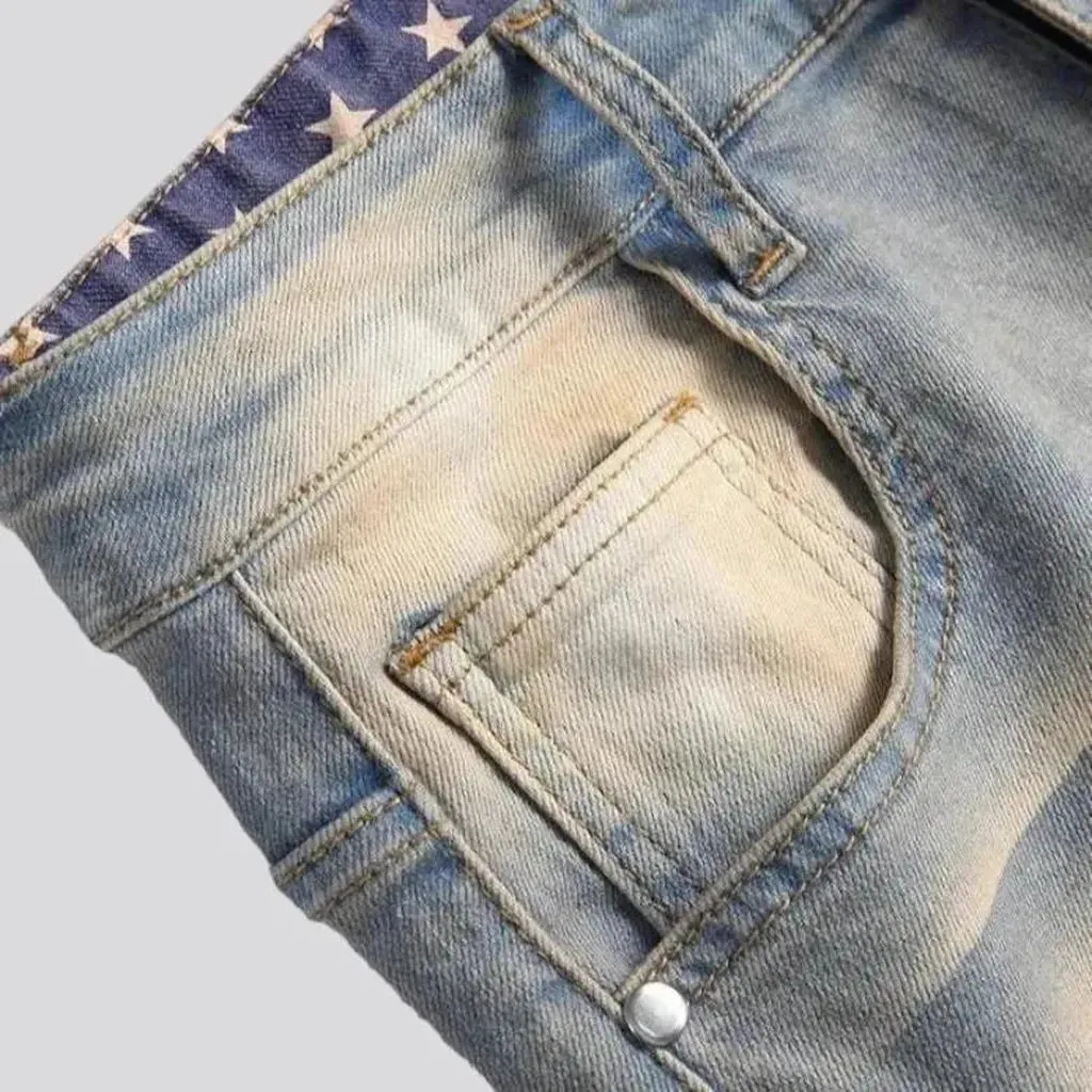 Yellow-cast stars-embroidery jeans for men