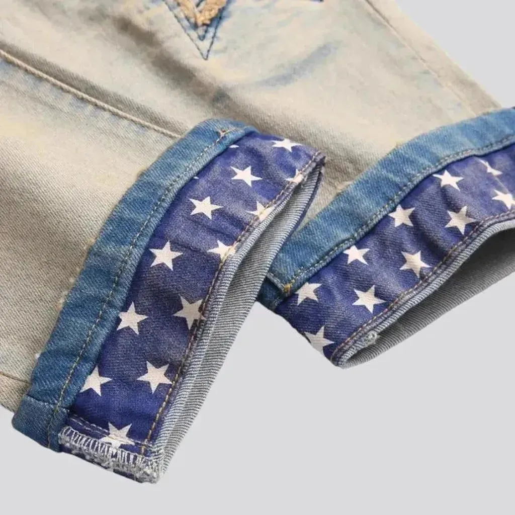 Yellow-cast stars-embroidery jeans for men